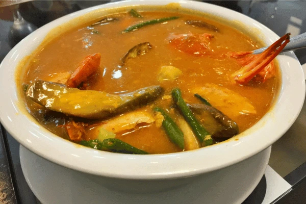 kare-kare. beef cubes in peanut sauce with various vegetables