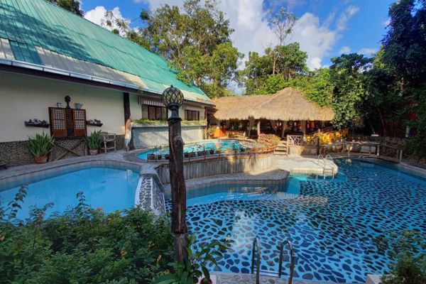 mutiple swimming pools in a resort