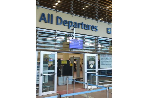Airport gate in Panglao Airport showing "All Departures"