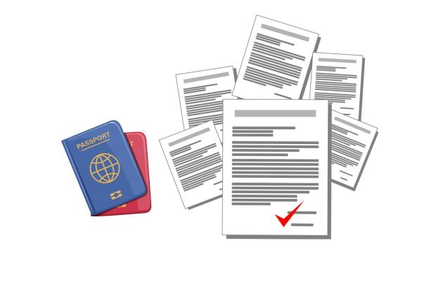 blue and red passport on the left and some documents on the right with a check mark