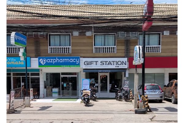 a hotel, a pharmacy, a gift shop, and a bank all lined in one place